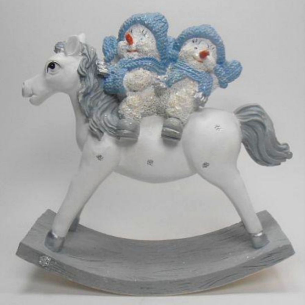 Snow Buddies on a rocking horse